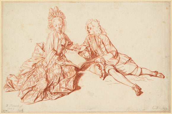 A man and a woman seated on the ground, sharing a book of music