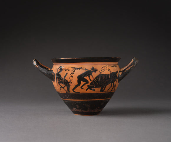 Attic black-figure pottery cup depicting a mythological scene