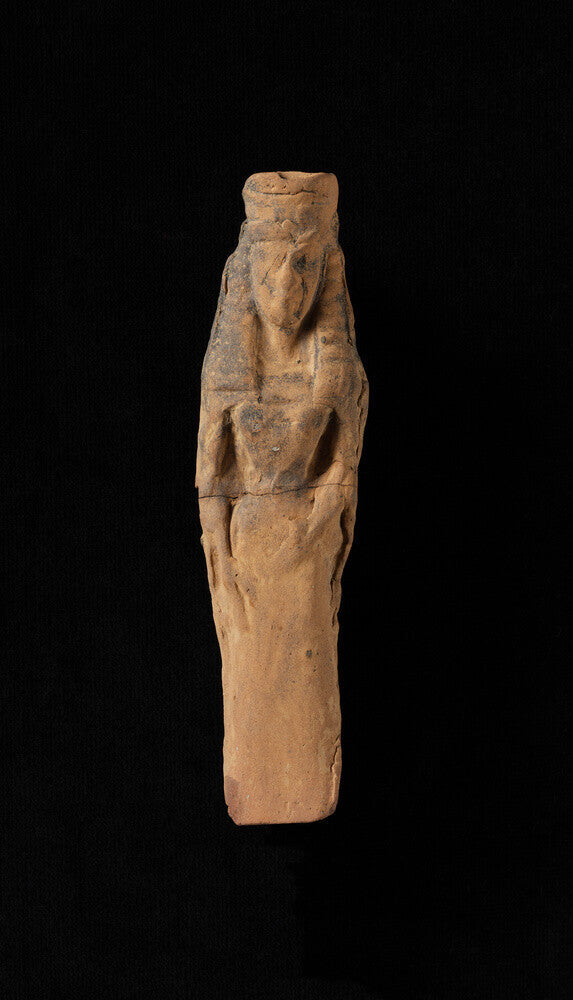 Terracotta female figurine wearing calathos