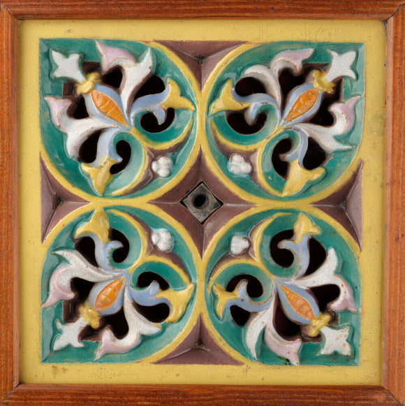 Tile, relief moulded and pierced with gothic quatrefoil design, 1851