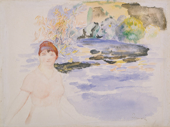 A woman seated by a lake