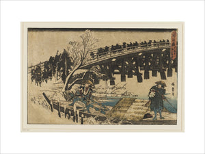 Two men in a boat under a bridge