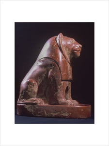 Seated lion on a plinth, polished red ware