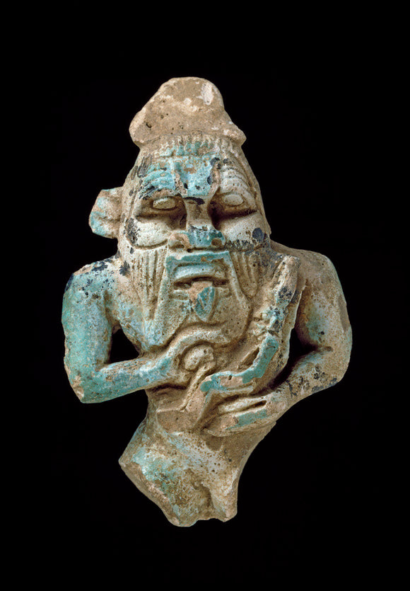 Faience amulet of Bes nursing a Horus