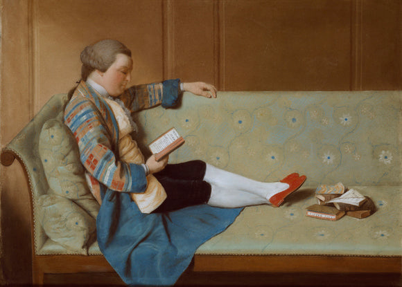 Portrait of a Man reclining on a Sofa, reading