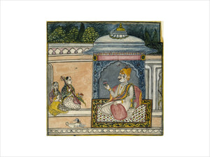A Raja seated on a terrace with two female musicians and a dog