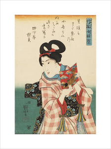 Woman holding a fish design book cover.