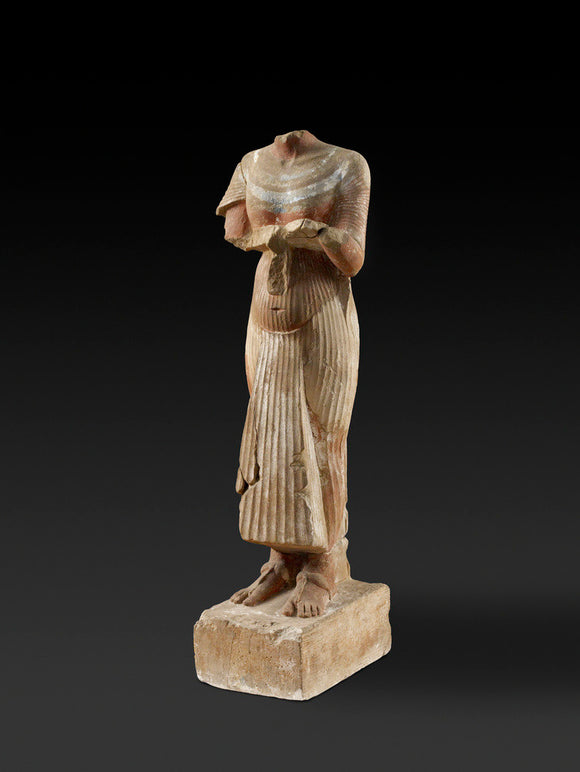Figure of Pharaoh Akhenaten holding an offering table